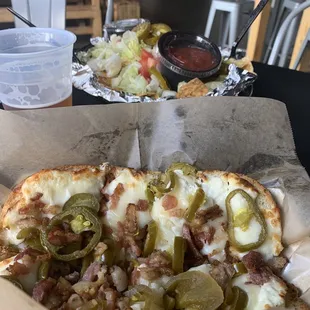 a closeup of a pizza with toppings