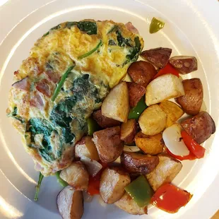 Spinach, ham and cheese omelet with potatoes