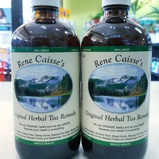 two bottles of reliee causee's original herbal tea