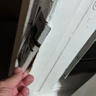 Door clearly kicked in recently and barely made an effort to fix.