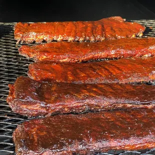 ribs cooking on a grill