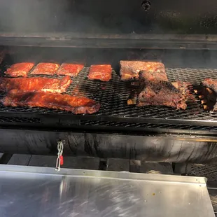 meat cooking on the grill