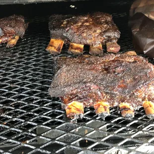 meat cooking on a grill