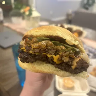 Double burger with grilled and raw onions