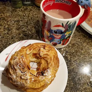 a pastry and a cup of coffee