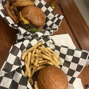 Double cheese burger and the Steadfast double cheese burger with onion rings and fries.