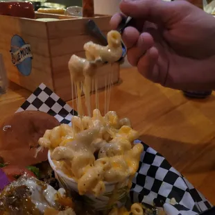 He couldn't resist the cheese pull