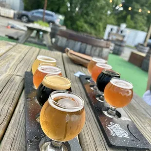 a flight of beers on a table