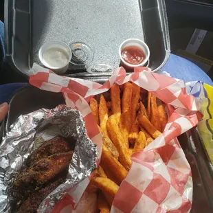 Lemon pepper wings and seasoned fries