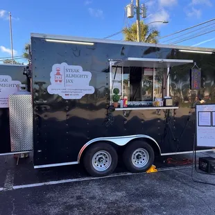 a food truck parked in a parking lot