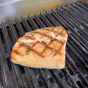 a piece of meat on a grill