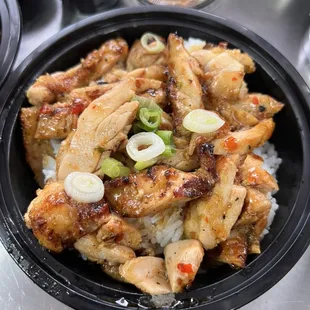 Almighty chicken bowl (Bbq) comes with steamed rice, papaya slaw and 1 pc Chicken Eggrolls