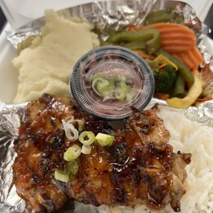 Almighty Chicken dinner comes with 2 sides, papaya slaw and sweet-chilli sauce