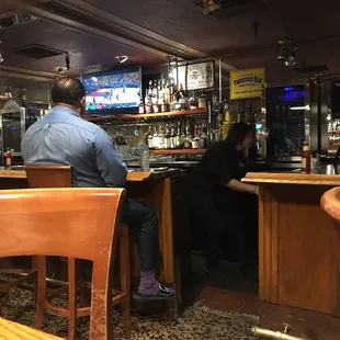 people sitting at the bar