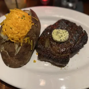 Colossal Baked Potato &amp; Rib Eye Steak (14 oz)