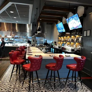 Bar area with TV&apos;s