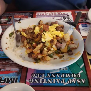 Steak &amp; eggs with potatoes and cheese