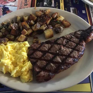 New York strip, scrambled eggs Fried potatoes