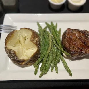 8 oz prime filet mignon, baked potato, sesame fried green beans
