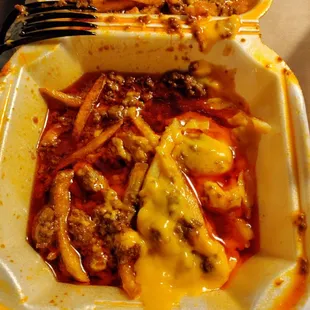 Chili cheese fries .  This photo is not edited.  The amount of oil is ridiculous.  Stay away from the chili cheese fries at all costs.