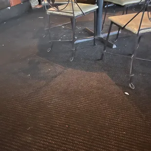 a table and chairs in a restaurant
