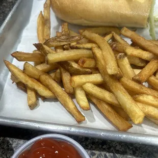 Triple Cheese Steak sandwich and fries.