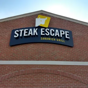 the sign on the outside of the restaurant