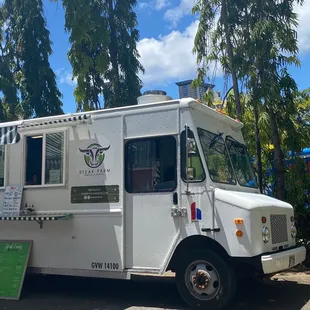 Food truck waiting area. They provide sanitizer.
