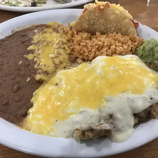 The special plate. Tex mex on a plate, chicken fried steak, gravy/cheese, cheese enchilada, rice and beans, white a crispy taco
