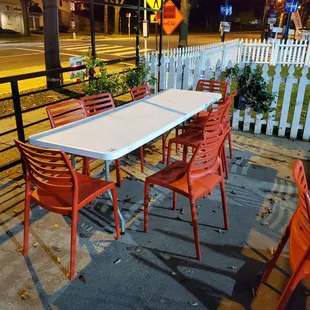 a table and chairs outside