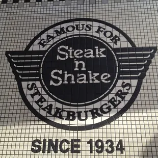 Tile logo in entrance