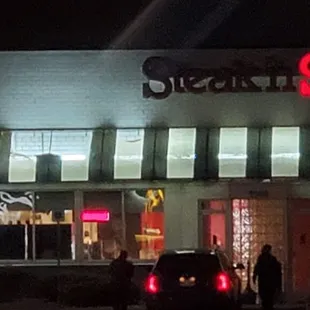 Awnings falling apart, sign is burnt out.. location is run down.