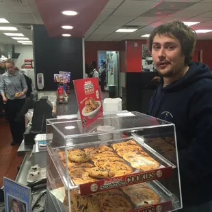 Look in the back through the doorway. One of the waitresses texting