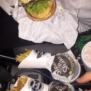 Sliders, guac steak burger, Parmesan and Cajun fries