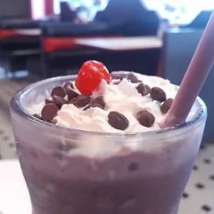 Something-berry milkshake, not very berry. Please help me out. :D Update: it was raspberry milkshake, I guess. :)
