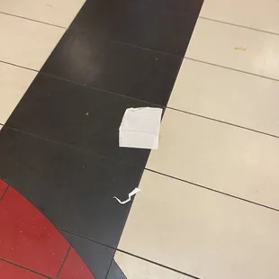 Trash on the floor.  More all throughout the restaurant.