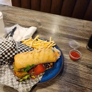 Filet mignon sandwich and French fries