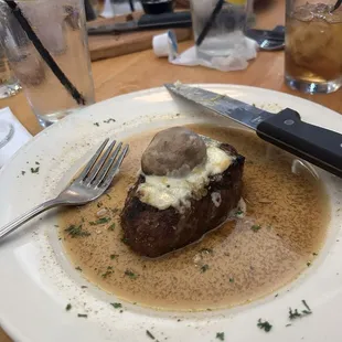 My filet perfectly cooked medium rate with the blue cheese topping