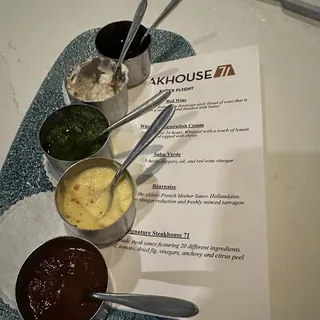 Enhance your experience with a Flight of all five (5) Sauces**