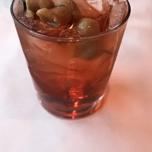 Whiskey old-fashioned sweet with pickled mushrooms