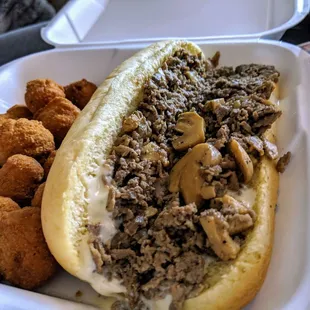 a sandwich and tater tots