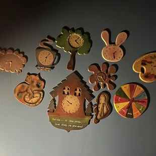 White rabbit looks at the clocks and realizes he is running late for a very important date.