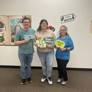 Some expert escape room participants who successfully escaped Wonderland with time to spare.