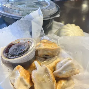 Pan seared dumplings, beek shank noodles and pork shrimp steamed bun.