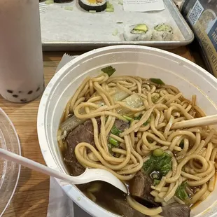 Oolong milk tea with tapioca, spicy beef shank noodles