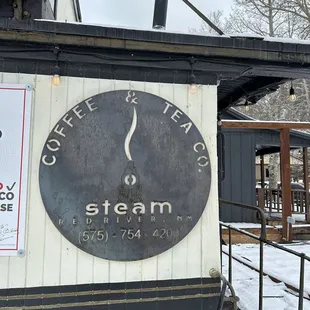 sign for steam coffee co