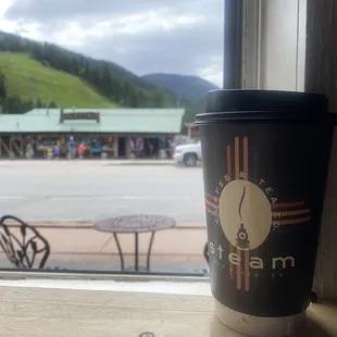 Lavender latte with a fantastic view out of the train car.