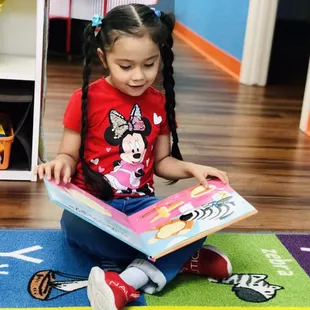 Reading and learning at STEAM Preschool!