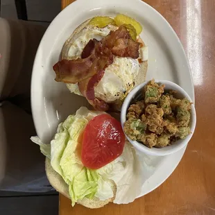 A 1/2 lbs. burger with over medium egg on top &amp; its delicious