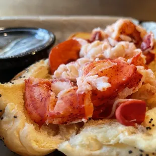 a lobster sandwich with pepperoni and mayonnaise